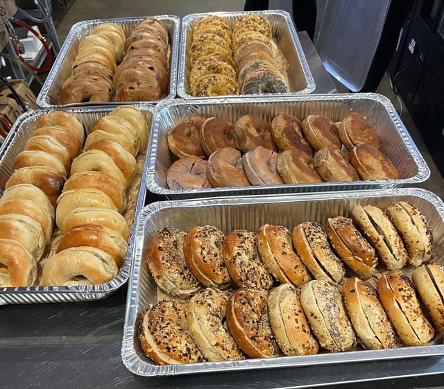 DOZEN BAGELS W/ 2 CREAM CHEESE.